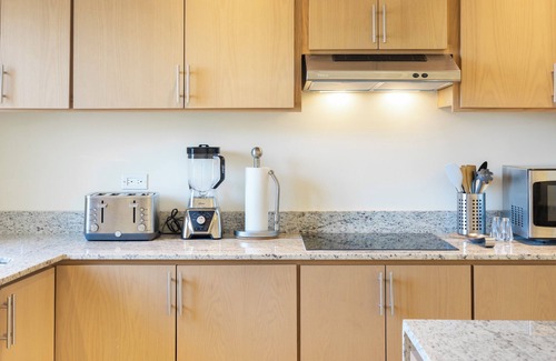 Colina del Sol Condominio | Condo con impresionantes vistas a la ciudad y al mar