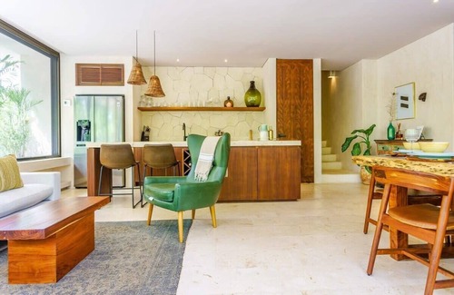 Barrio Zama Condominio | Stunning Tulum Condo: Rooftop Pool & Modern Design