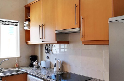 Vale de Parra Apartamento | Apartamento de lujo de 2 dormitorios con aire acondicionado y piscinas comunitarias, cerca de la playa.