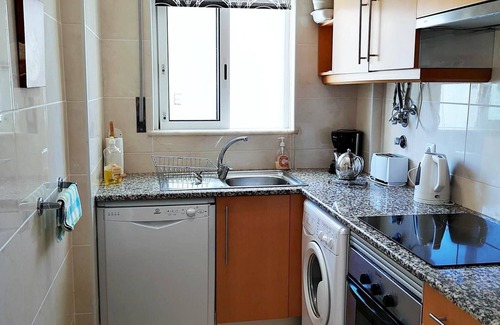 Vale de Parra Apartamento | Apartamento de lujo de 2 dormitorios con aire acondicionado y piscinas comunitarias, cerca de la playa.