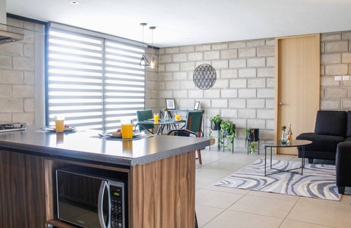 Centro de Guadalajara Apartamento | Stylish Authentic Loft w/Gym & Coworking | 1 BD | Tribu Colón