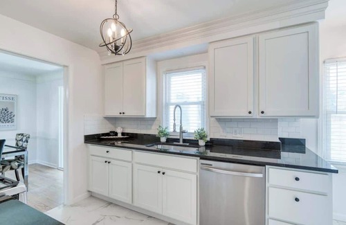 Cleveland Casa | VNTG 3BR Designer Home w/ Deck, Sunroom & Finished Basement