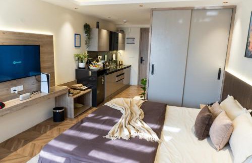 Jaypee Greens Apartamento | Stylish & Comfortable Studio near Expo Center Greater Noida opposite Metro