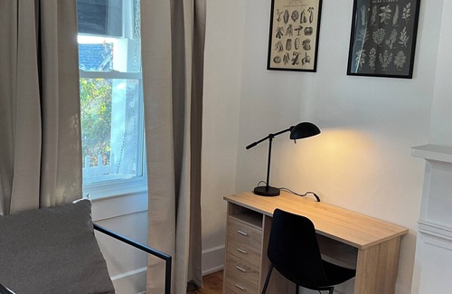 CUF Casa | Stylish home overlooking the city, walkable to streetcar!