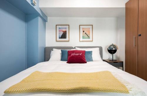 Bagumbayan Apartamento | Stylish loft, 65 in UHDTV w Fast WiFi + Pool & Gym