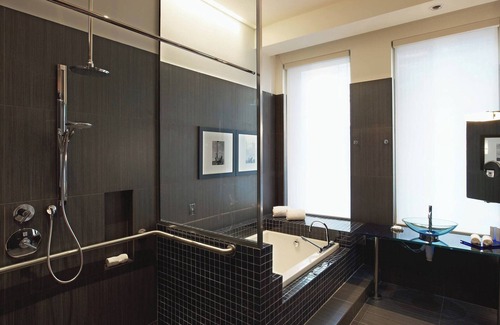 Downtown Dallas Hotel | Stylish Multi-Level Suite with Bold Interiors and Loft Architecture