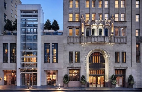 Downtown Dallas Hotel | Stylish Multi-Level Suite with Bold Interiors and Loft Architecture