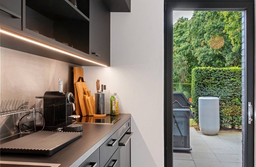 Meppen Casa | Moderno apartamento vacacional con terraza y jardín compartidos y wifi