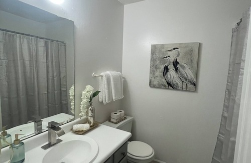 Greensboro Casa | Stylish Townhome Guest Room with Guest Bath