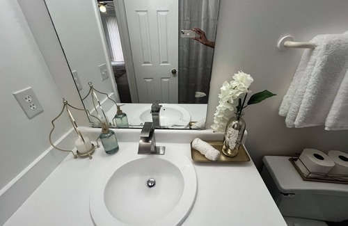 Greensboro Casa | Stylish Townhome Guest Room with Guest Bath