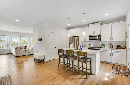 Allyn Casa | Stylish, two-story home with a washer/dryer & furnished porch - dogs welcome