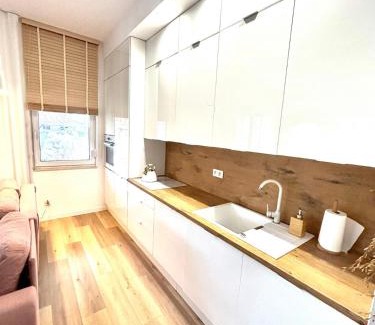 Poznan Apartamento | Stylowy apartament z prywatnym ogrodem, widokiem na park i parkingiem - Red Park Poznań