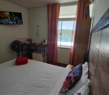 Taio Apartamento | Suíte Âncora - Vista Mar