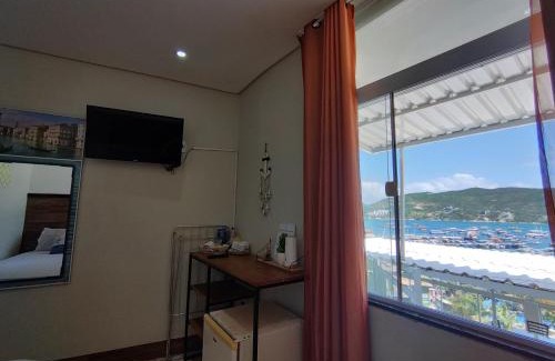 Taio Apartamento | Suíte Âncora - Vista Mar