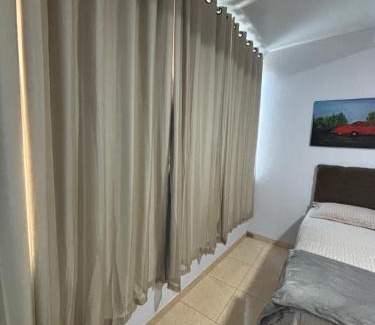 Goiania Apartamento | Suíte confortável e espaçosa