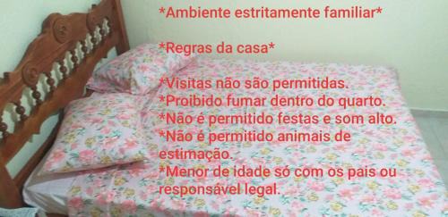 Praia da Enseada Apartamento | Suíte externa com entrada independente