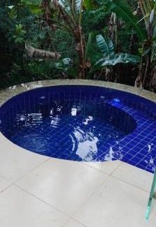 Pescaria Apartamento | Suite com jacuzzi privativa