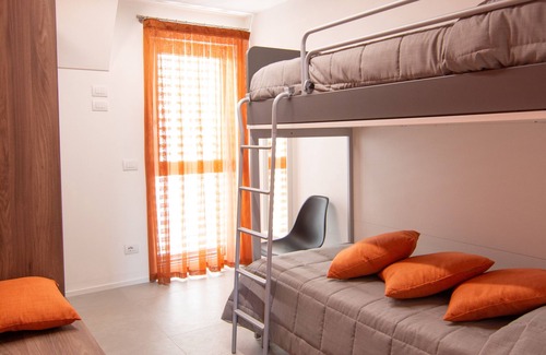 Cagnona Condominio | Suite Malvasia suite en un nuevo edificio privado cerca del mar y del centro.