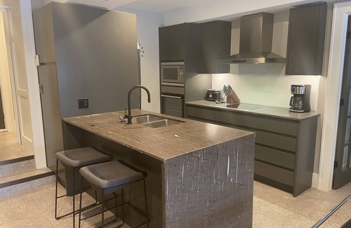 Highland Casa | Suite nestled in a garden beside a 13 acre park in the heart of the city.