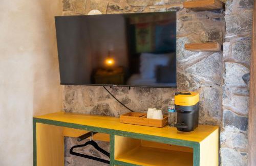 Santeagueda Apartamento | Suite Raffaello: Diseño y Comodidad en Val'Quirico