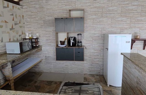 Barra Nova Apartamento | Suite with queen-size bed, smart TV, air conditioning, minibar and bidet
