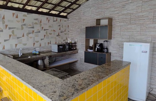 Barra Nova Apartamento | Suite with queen-size bed, smart TV, air conditioning, minibar and bidet