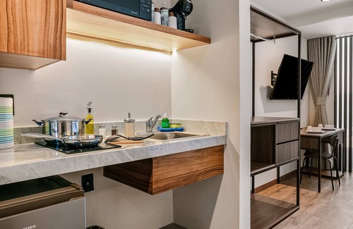 Querétaro Apartamento | Suites Álamos by Homirent