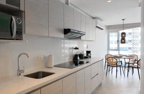 Simón Bolívar Apartamento | Suites cerca del aeropuerto - terminal terrestre y centros comerciales