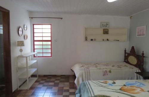 Passa Quatro Casa | Suites Delicia