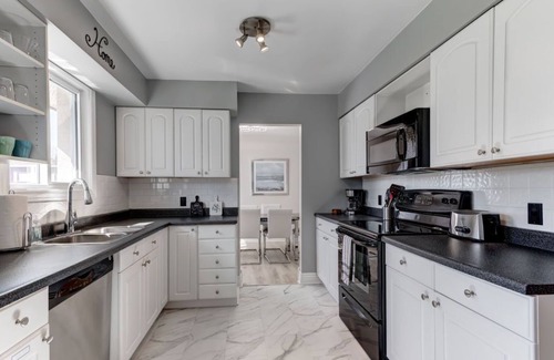 Brighton Casa | Summer Breeze Lakeside House with Beach Access and HOT TUB