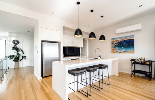 Curlewis Casa | Summer-Ready Retreat: Sparkling Bay Views, Heated Pool, Fire Pit & Games