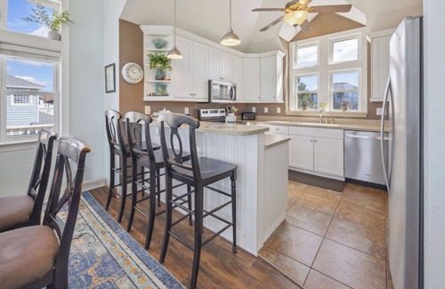 Wind Over Waves Casa | SUMMER SAVINGS Semi-Soundfront Dog Friendly w Pool, Hot Tub, Elevator, Cmty Dock