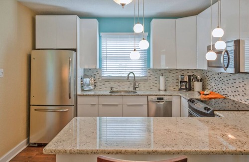 Courier City - Oscawana Casa | South Tampa SOHO Bungalow Home
