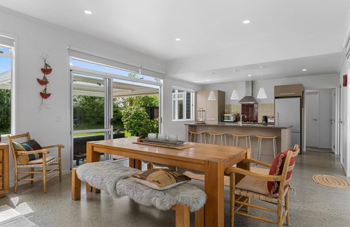 Mangawhai Casa | Sun Central - Modern, sunny holiday home in tranquil garden setting
