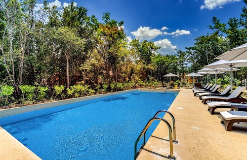Tulum Casa | Sun-filled & dog-friendly resort home with outdoor pool, gym, patio, & courts