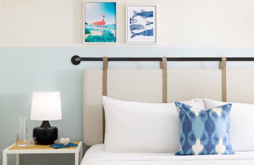 New Town Hotel | Sun, Sip, & Socialize | Island Stay w/ 2 Pools & Backyard Bash