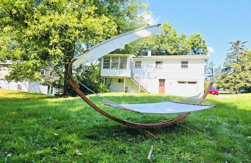 Fairview Casa | Sunkissed Escape Bright Sunroom + Hammock Fun