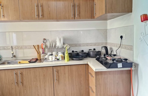 Ngara Apartamento | Sunlit hideaway blending city convenience with cozy charm and local insights.