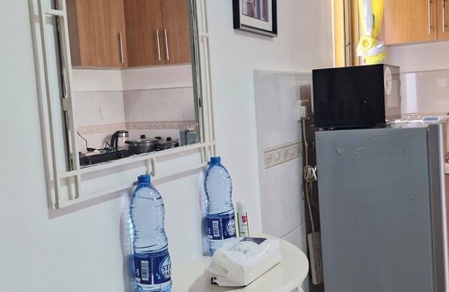 Ngara Apartamento | Sunlit hideaway blending city convenience with cozy charm and local insights.