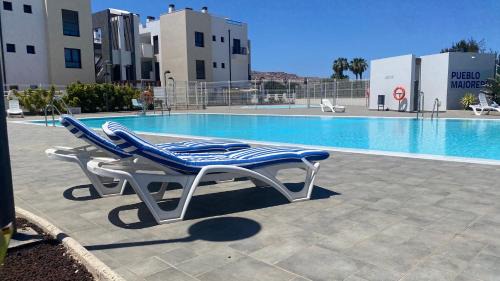Caleta de Fuste Apartamento | Sunny Luxury Apartment with two great sunny - level terraces, two swimming pools, in a new complex Pueblo Majorero, close to Fuerteventura Golf Club, next to the beach , Atlantico Shopping Mall and casino in Caleta de Fuste