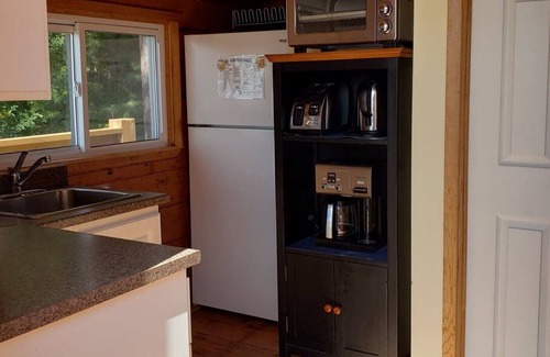 Killaloe Cabaña | Tranquila cabaña con playa SW exposición WIFI y TV por cable y chimenea