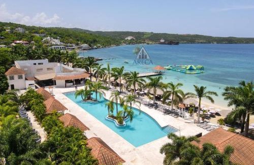 Discovery Bay Casa | Sunset at ArecaHomes Beach Access Pool and Water Park