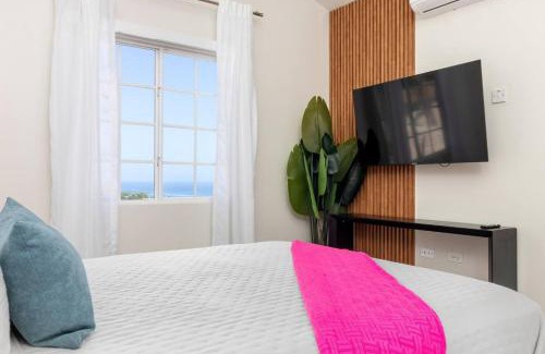 Discovery Bay Casa | Sunset at ArecaHomes Beach Access Pool and Water Park