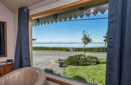 Sequim Cabaña | Sunset Bay Cottage - King, jetted tub, Ocean view, Full Kitchen