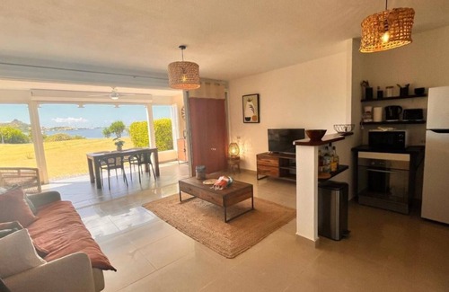 Marigot Apartamento | Sunset on lagoon from the terrace