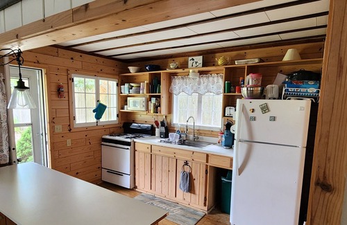 Cheboygan County Cabaña | Sunset Shores 2 Bedroom 1 Bath Burt Lake Cottage- Sleeps 8