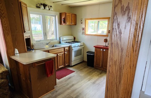 Cheboygan County Cabaña | Sunset Shores 3 Bedroom 1 Bath Lakefront Burt Lake Cottage- Sleeps 6