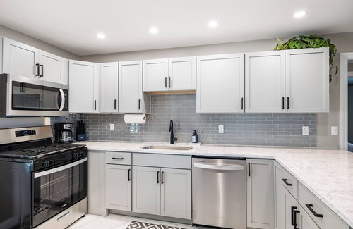 La Porte Casa | Sunset Shores - Lakefront Home with Hot Tub and Fire Pit