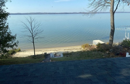 Alden Cabaña | Sunsets & Private Sandy Beach Cottage on Torch Lake in Alden