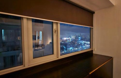 Pasig Apartamento | Sunshine 100 Plaza - Bright and cozy 1 bedroom with washer